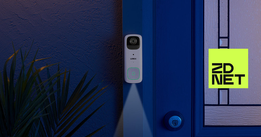Lorex 2K battery-powered video doorbell mounted beside a front door at night, with a soft spotlight illuminating the ground and ZDNET logo in the corner, featured in an article about switching from Ring to a subscription-free alternative.